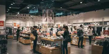 Modern retail store with digital analytics overlay, showcasing data-driven merchandising success.